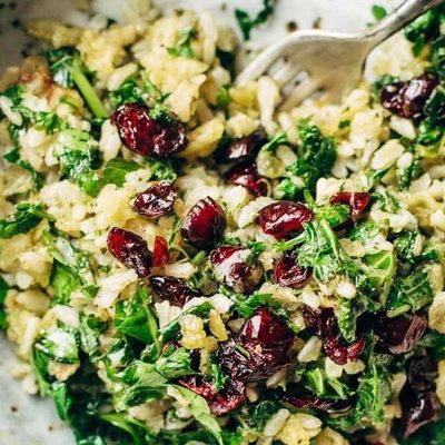 Garlic Kale and Brown Rice Salad in a bowl with a fork.