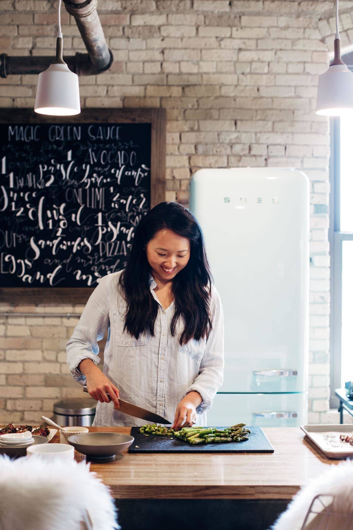 Woman cooking in a kitchen.