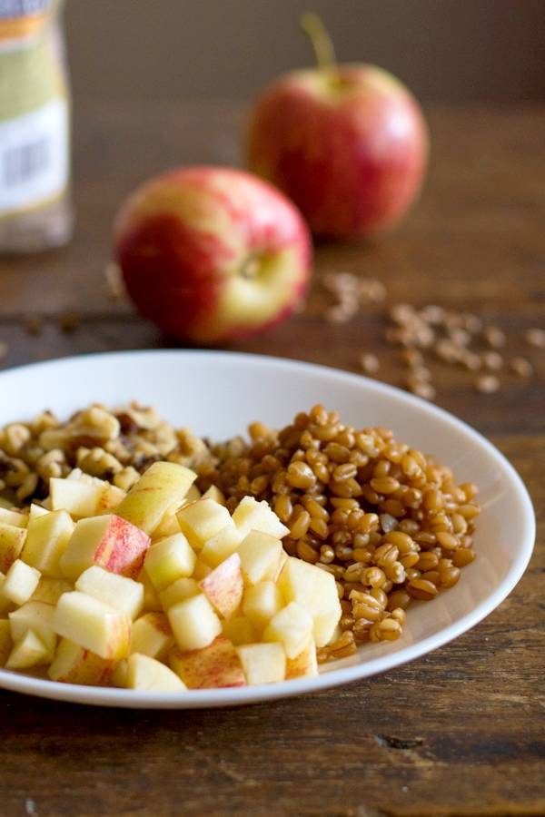 Apples sliced on a plate.